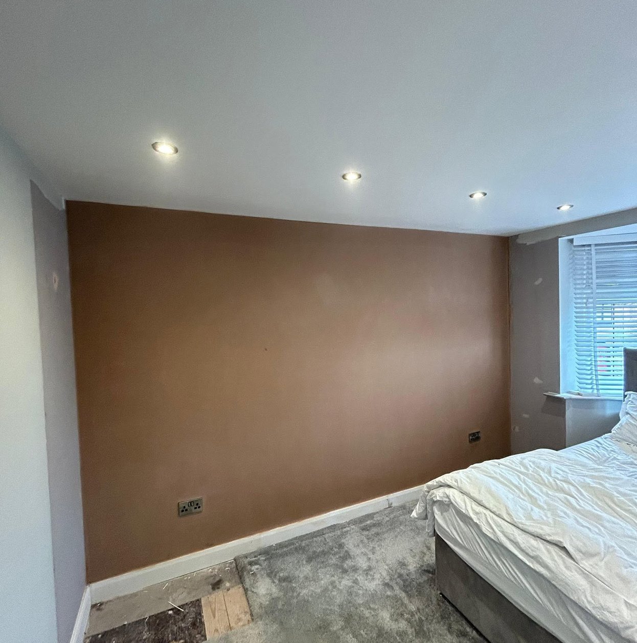 Freshly plastered interior wall in a bedroom